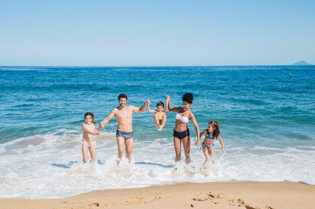 Young family at the shoreline