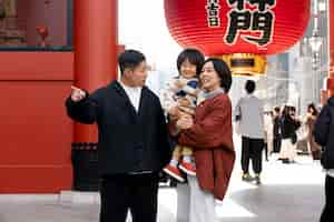 Free photo young family spending time with their toddler