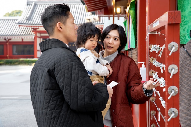 Young family spending time with their toddler