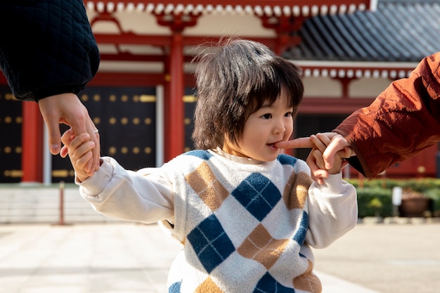 Young family spending time with their toddler