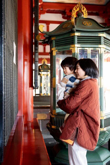 Free photo young family spending time with their toddler