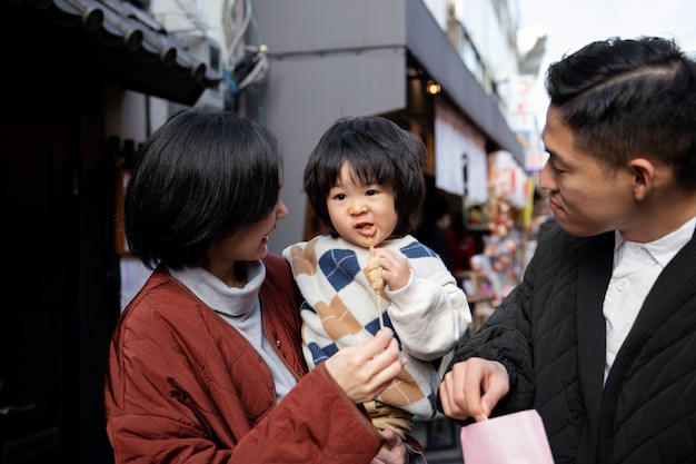 Young family spending time with their toddler