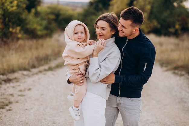 Young family together with little son