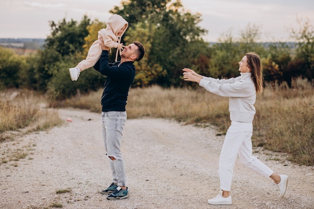 Young family together with little son