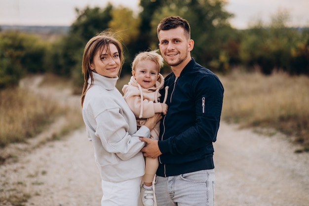 Young family together with little son