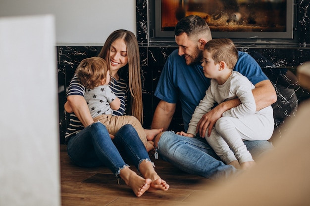 Young family with two sons in the house