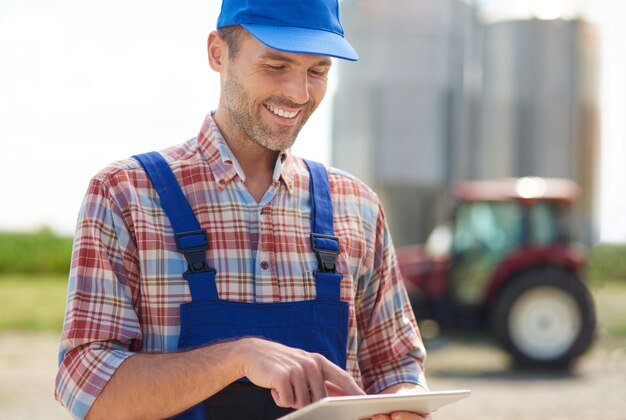 Young farmer taking care of his business