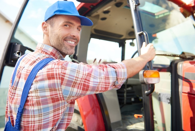 Young farmer taking care of his business