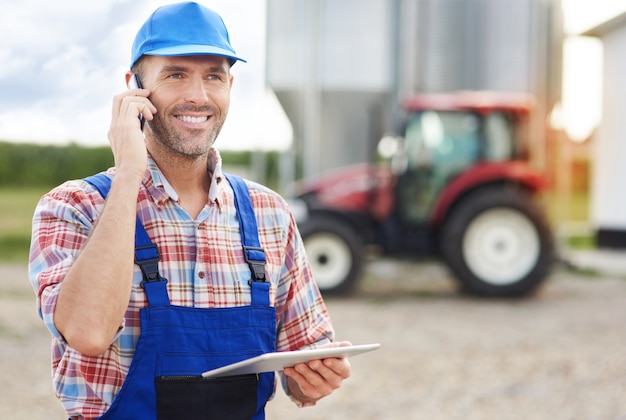 Young farmer taking care of his business