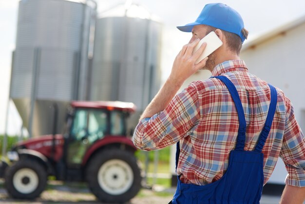 Young farmer taking care of his business