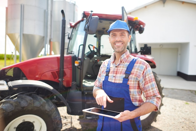 Young farmer taking care of his business