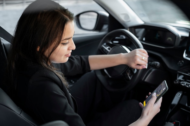 Young female being an uber driver