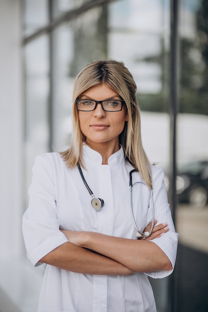 Young female doctor in hospital ambulance