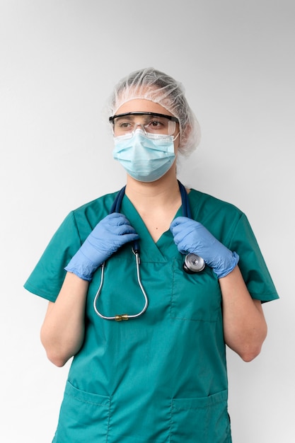 Young female doctor wearing a protective equipment