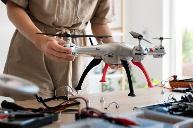 Young female inventor in her workshop