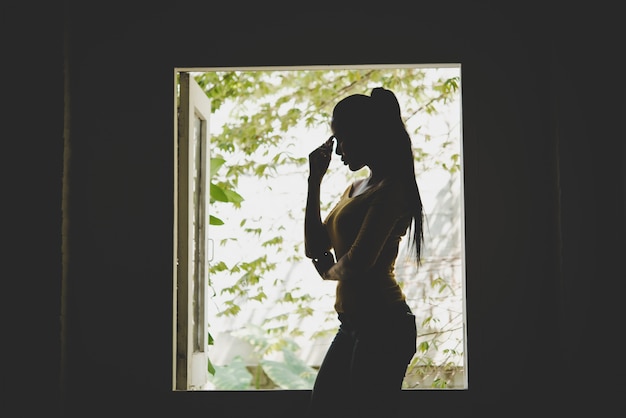 Free photo young female silhouette looking girl