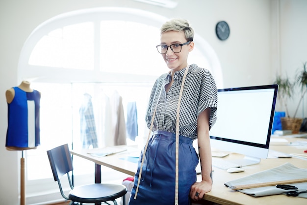 Free photo young female tailor