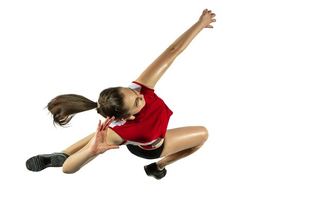 Young female volleyball player isolated on white  background.