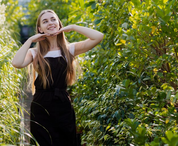 Young female with apron posing