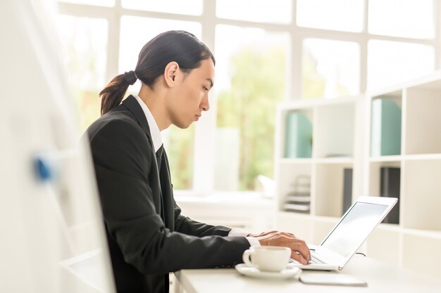 Young Financial Manager at Work