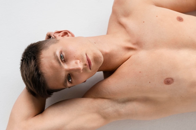 Free Photo young fit man portrait top view