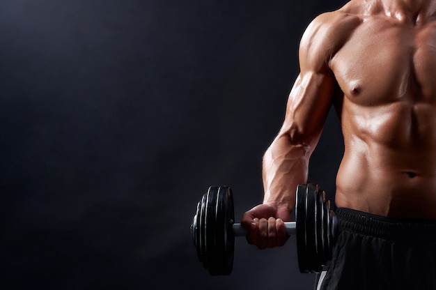 Free photo young fitness man in studio