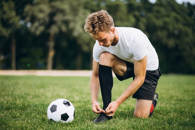 Young football player at the football field