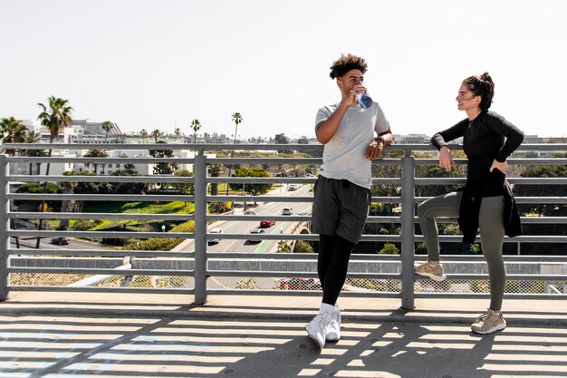 Young friends on break from jogging