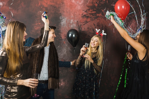 Young friends celebrating new year