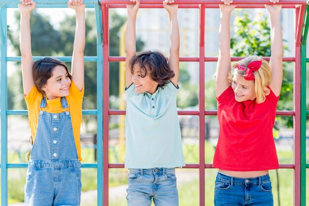 Young friends in park playing