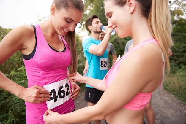 Young friends running during a marathon