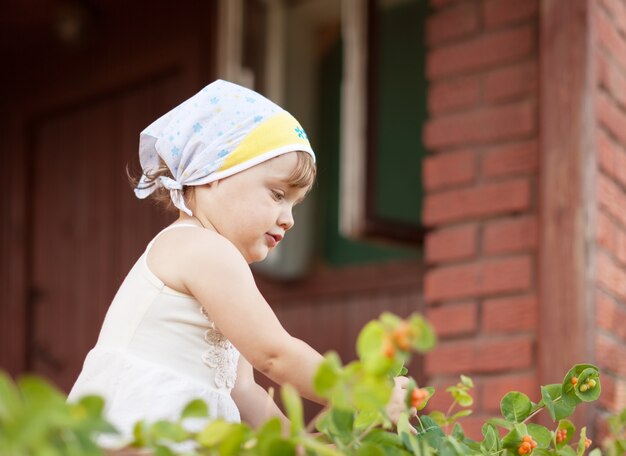 Young gardener working in garden