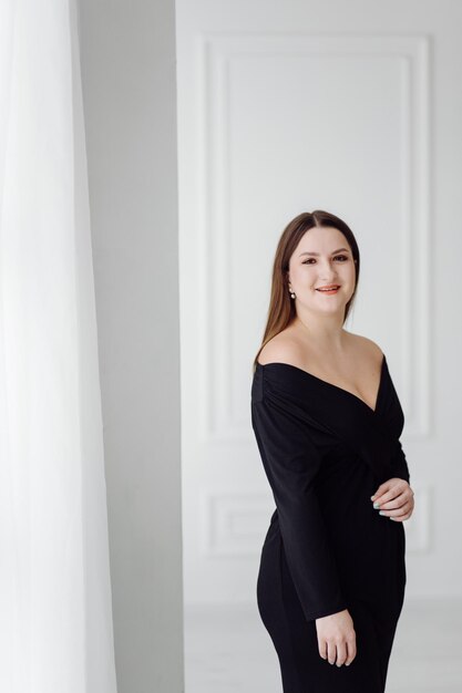 Young girl black dress portrait