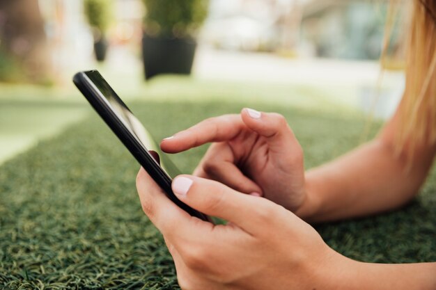 Young girl browsing on smartphone