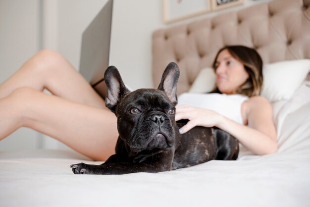 Young girl chilling with her puppy