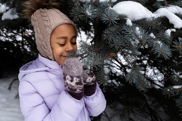 Young girl enjoying a winter day outdoors