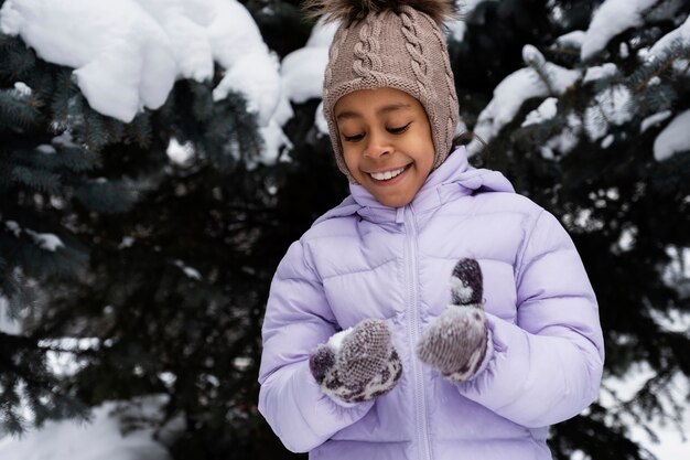 Young girl enjoying a winter day outdoors