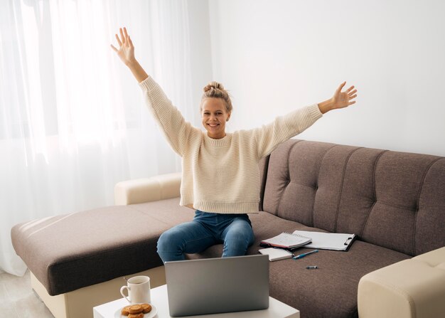 young girl happy to study at home