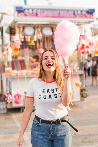 Young girl having fun in the amusement park