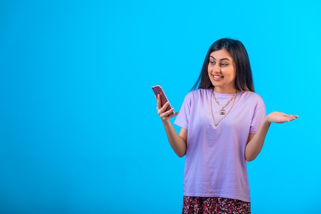 Young girl having online video call. 