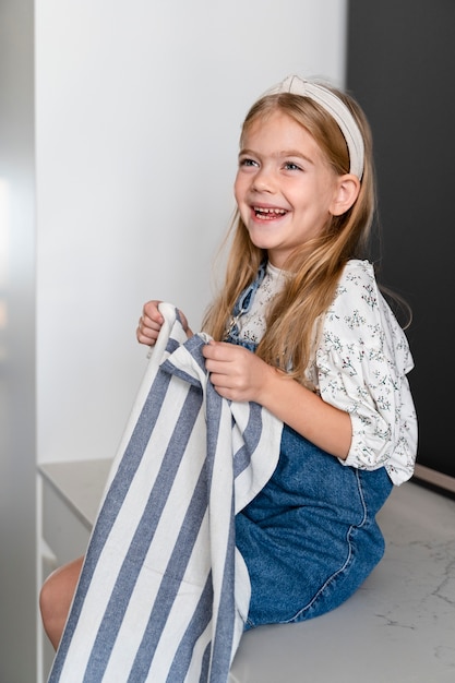 Young girl helping with the cooking