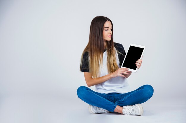 Young girl and her tablet