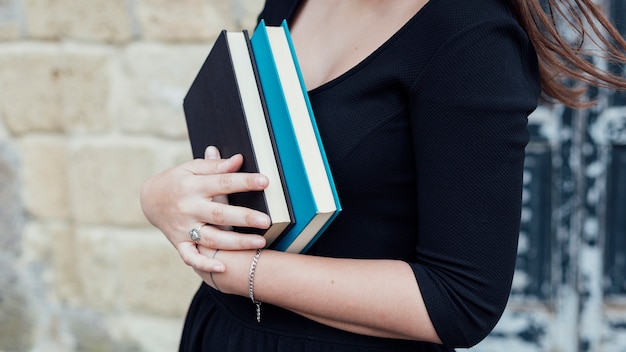 Young girl holding a book