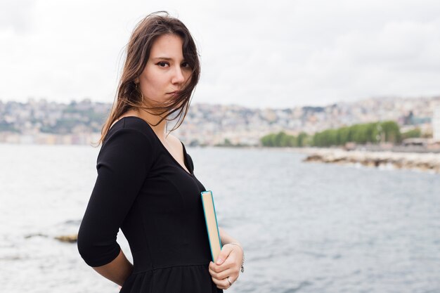 Young girl holding a book