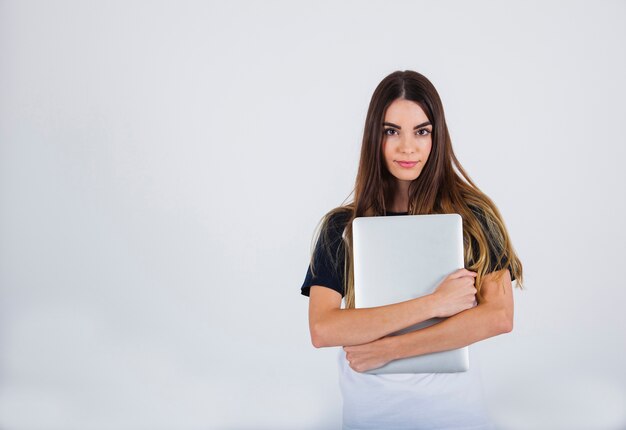 Young girl in love with her lap top