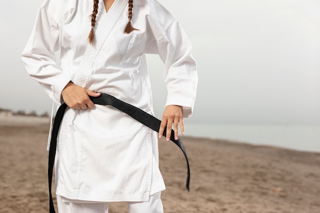 Young girl in martial arts costume