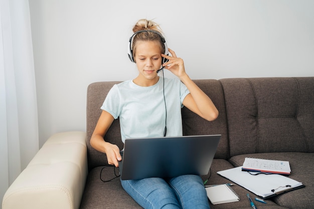 Young girl paying attention to online class