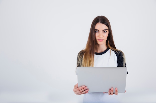 Young girl posing with lap top