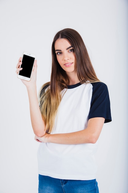 Young girl proud of her new smartphone