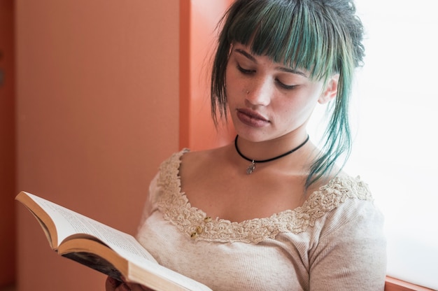 Young girl reading a book